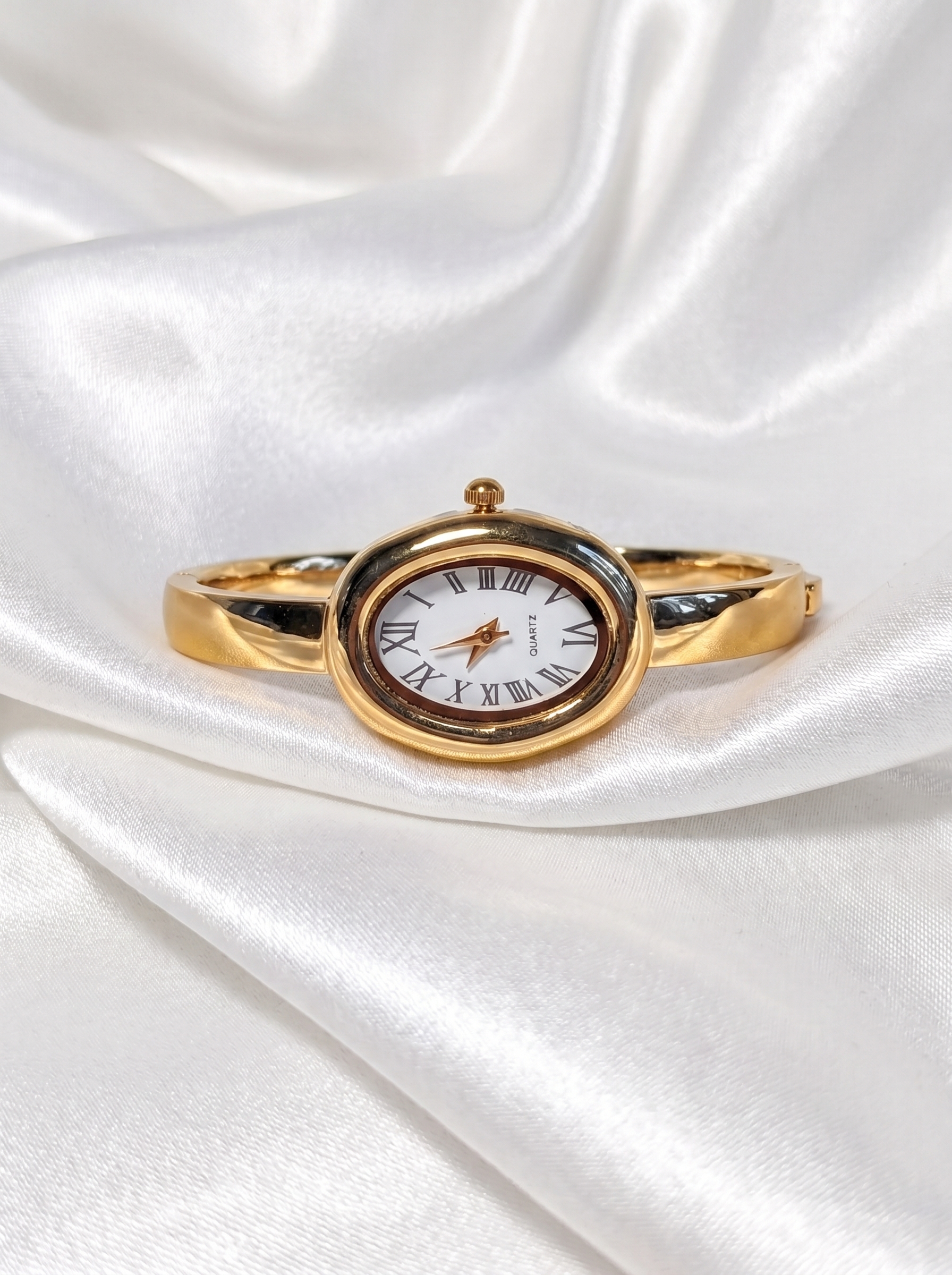 Gold Roman Watch