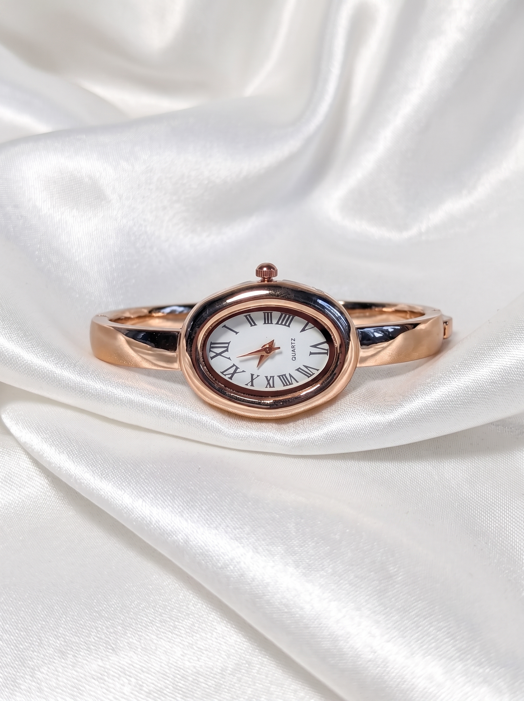 Rose Gold Roman Watch